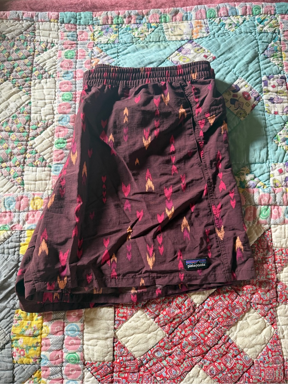 Patagonia Women's Burgundy Shorts with Pink and Gold Arrow Print
